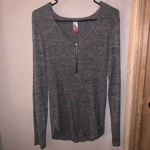 Gray long sleeve top.